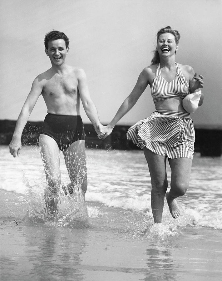 Couple On Beach Photograph by George Marks