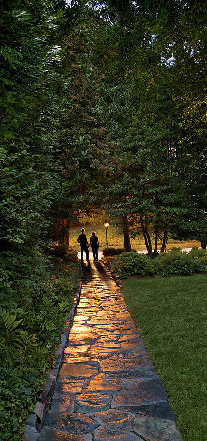 Couple On Stone Pathway In Garden Photograph by Greg Pease