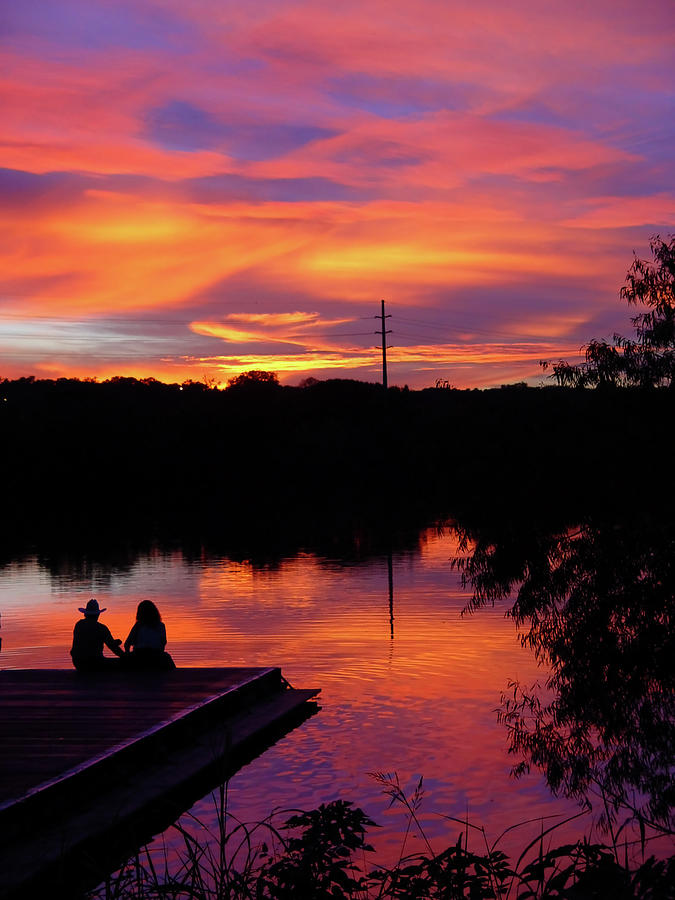 Couple On The Dock And A Sunset Photograph by Tomwald