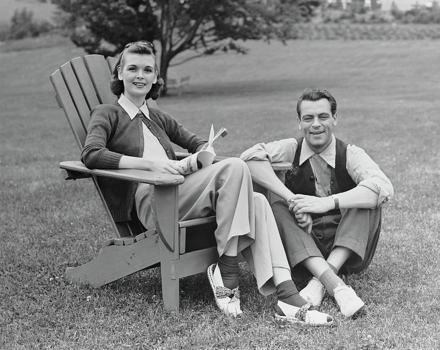 Couple Sitting Outdoors Photograph by George Marks