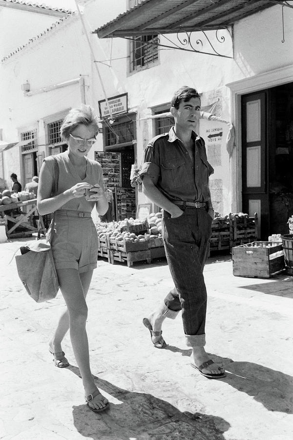 Couple Walking In Hydra Photograph by James Burke
