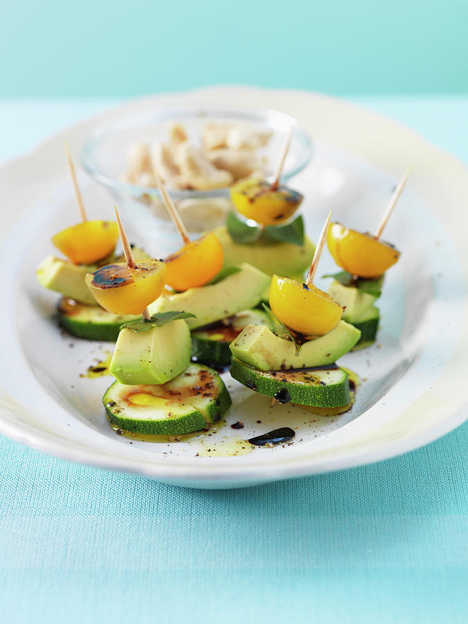 Courgette And Avocado Skewers Photograph by Andreas Thumm