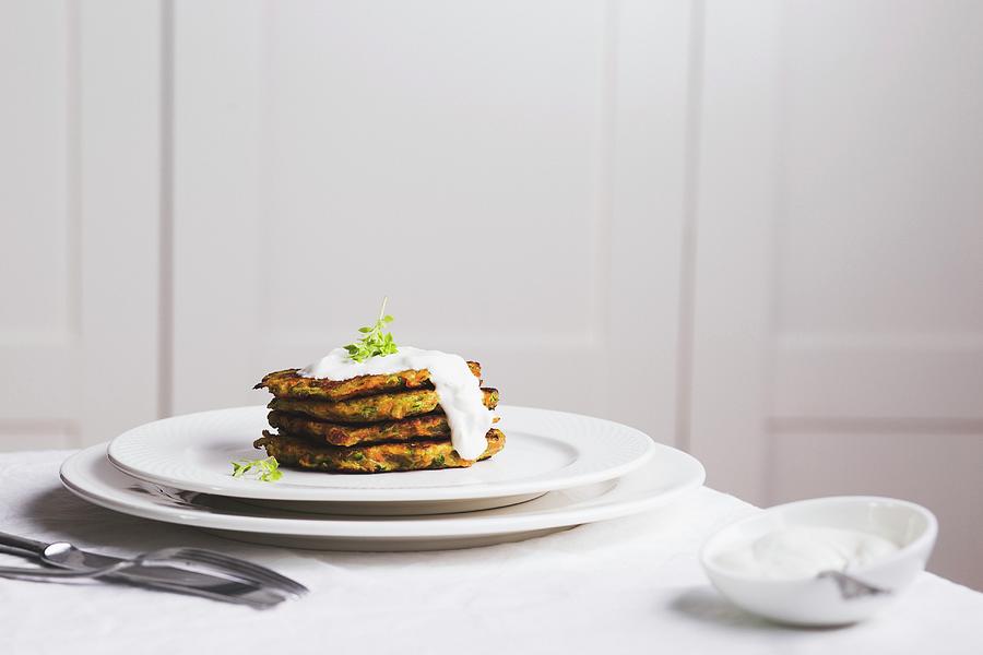 Courgette And Carrot Fritters Photograph by Karolina Kosowicz