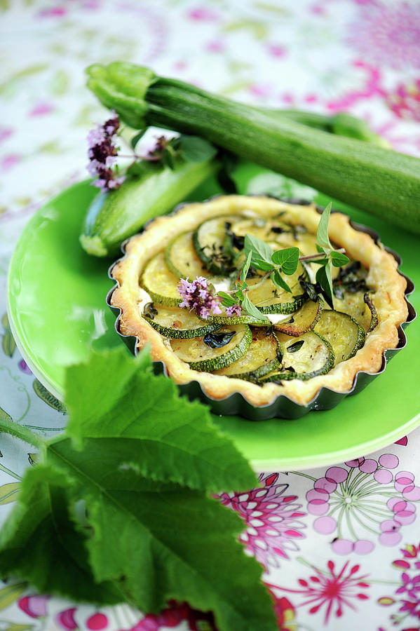 Courgette And Herb Tartlet Photograph by Schmitt