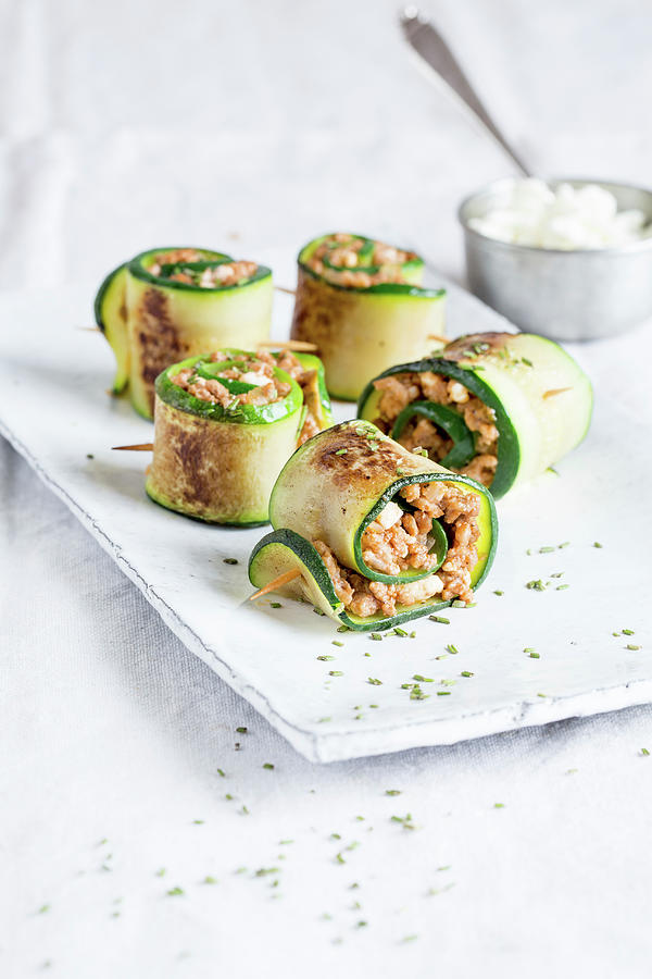 Courgette And Minced Meat Rolls Photograph by Claudia Timmann