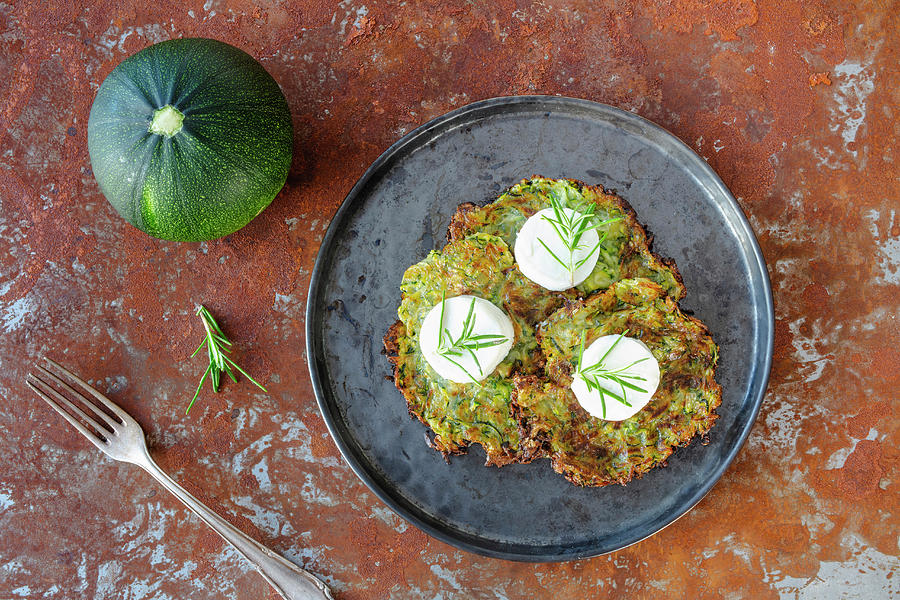 Courgette Fritters With Goats Cheese Photograph by Jan Wischnewski