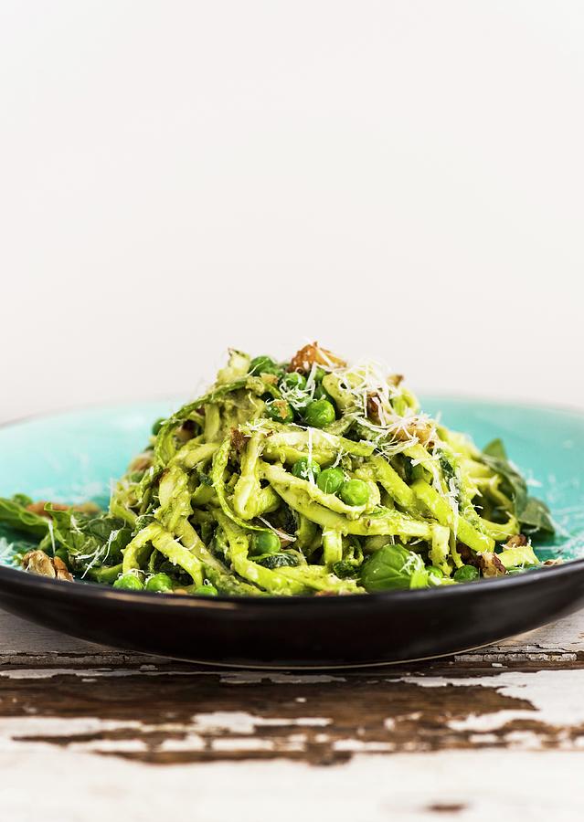 Courgette Noodles With Avocado Pesto And Peas Photograph by Hein Van Tonder