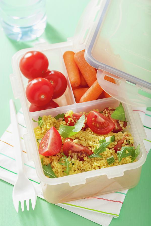 Couscous Salad And Mini Vegetables In A Lunchbox Photograph by Olga Miltsova