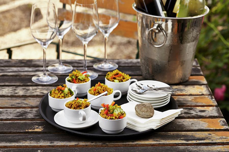 Couscous Salad In Coffee Cups On A Black Tray Photograph by Herbert Lehmann
