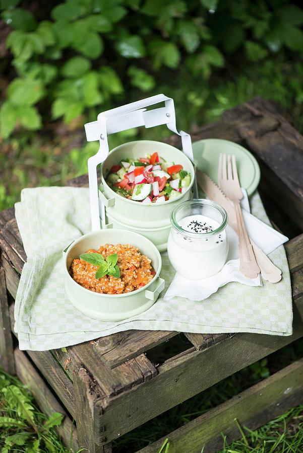 Couscous Salad, Tomato & Cucumber Salad And Yoghurt Dressing For A Picnic Photograph by Fotografie-lucie-eisenmann