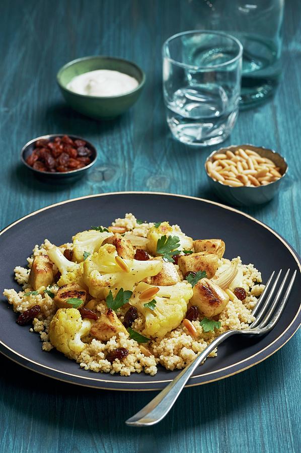 Couscous With Cauliflower And Chicken Breasts Photograph by Ulrike Emmert