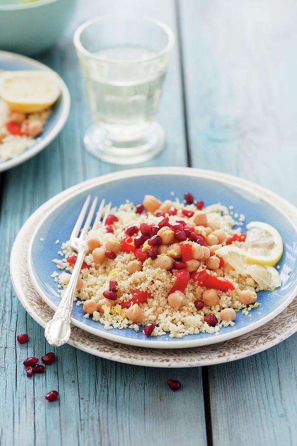 Couscous With Chick Peas, Roasted Peppers, Pomegranate Seeds And Cumin Photograph by Victoria Firmston