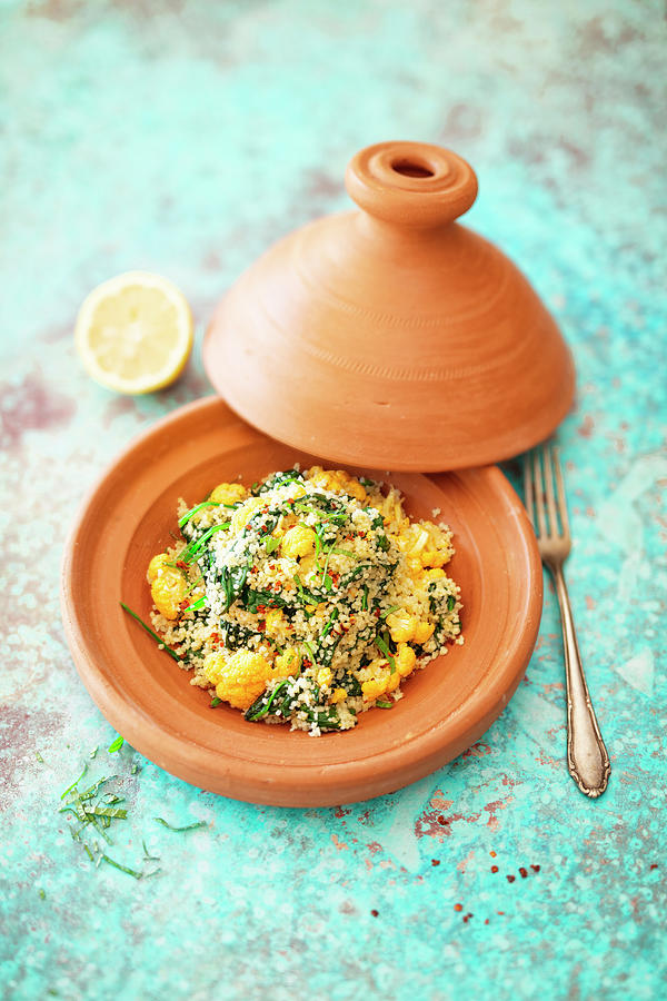 Couscous With Yellow Cauliflower, Spinach And Mint In A Tagine vegan Photograph by Jan Wischnewski