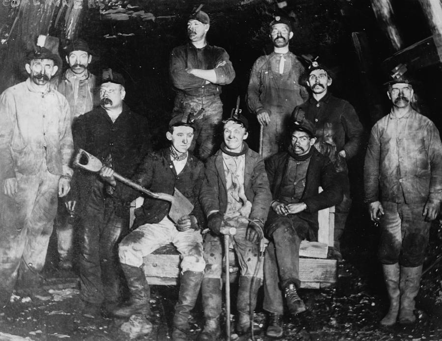 Covered in Coal Dust, The miners pose after a days work Painting by 