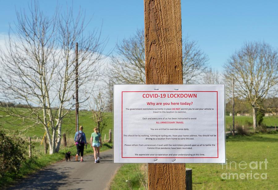 Covid-19 Lockdown Warning Sign Photograph by David Parker/science Photo Library