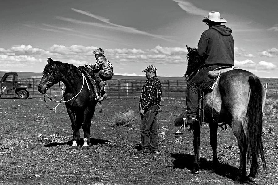 Cowboy Kid getting on his horse  Photograph by Julieta Belmont