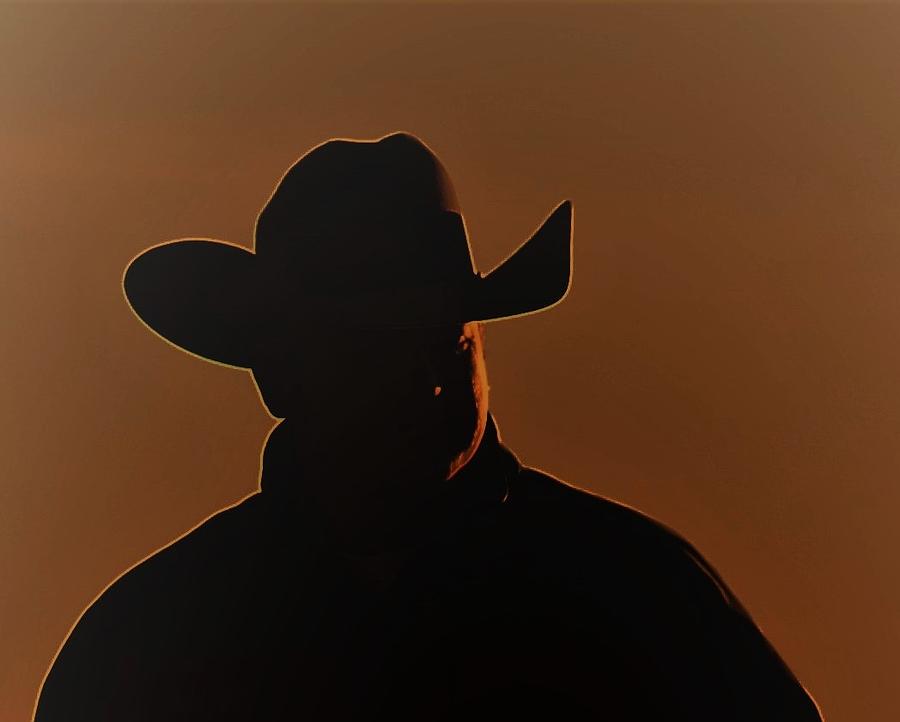 Cowboy Sunrise Photograph by John Glass