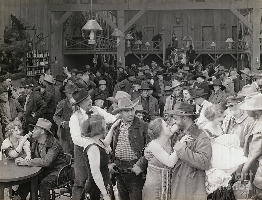 Cowboys Dancing With Girls In Saloon Photograph by Bettmann