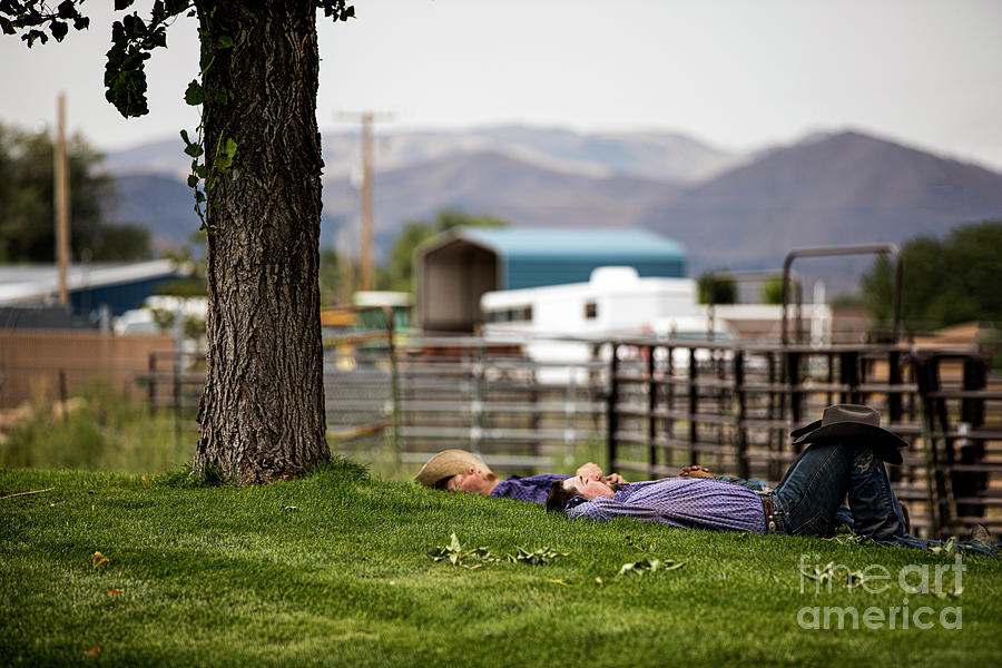 Cowboys Resting under a Tree Photograph by Diane Diederich
