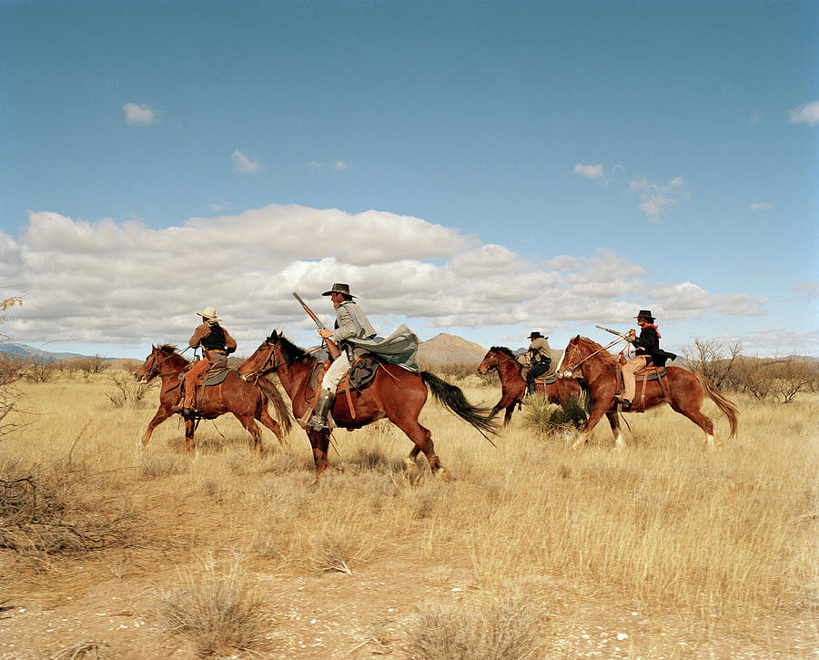 Cowboys Riding On Horses Photograph by Matthias Clamer