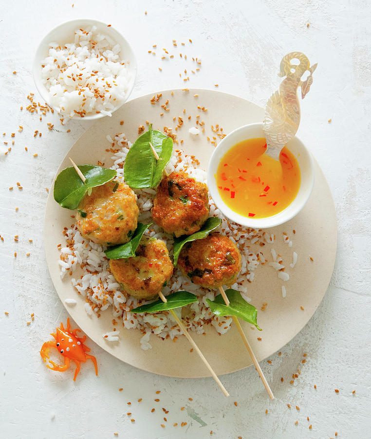 Crab Meatballs With Kaffir Lime Leaves, An Orange And Chilli Sauce And Aromatic Sesame Seed Rice Photograph by Udo Einenkel