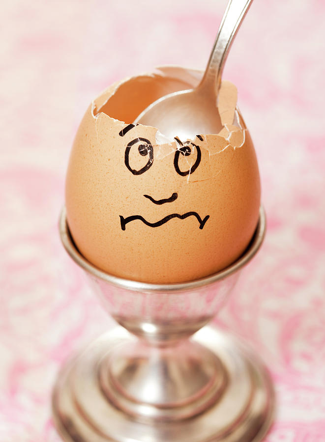 Cracked Egg With Face Drawn On It Photograph by David Malan