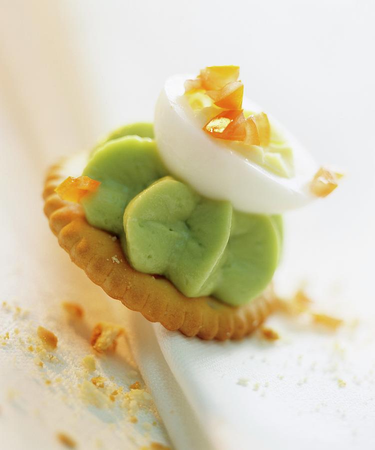 Cracker Topped With Avocado Mousse And Egg Photograph by Michael Wissing