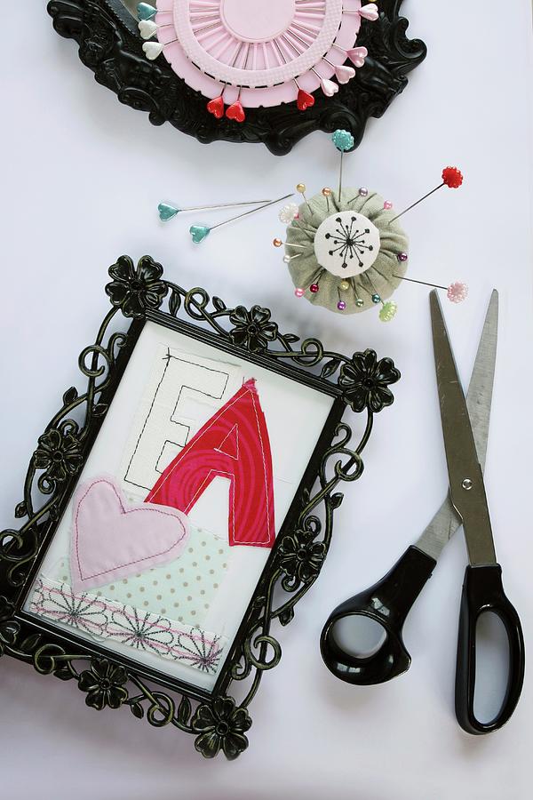 Craft Idea For Picture Frames: Cut-out Fabric Letters collage Photograph by Regina Hippel