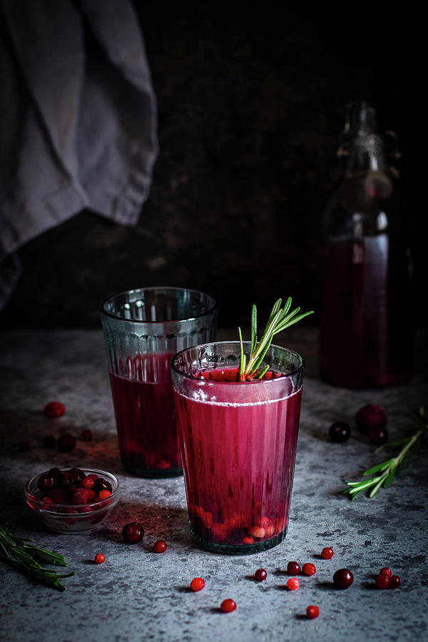 Cranberry Drink With Rosemary Photograph by Yulia Shkultetskaya