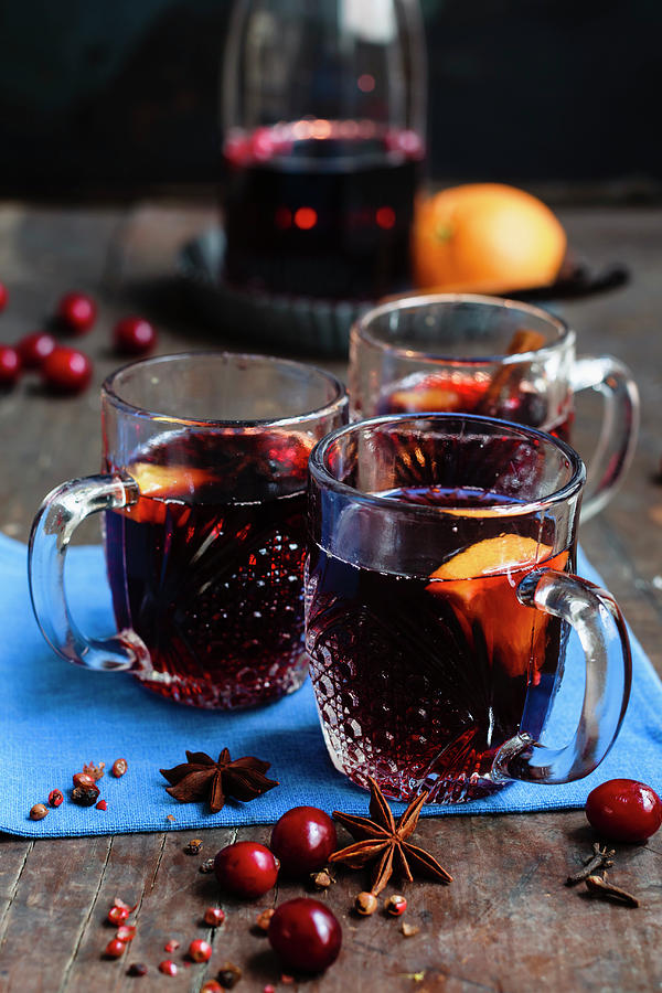 Cranberry Punch With Oranges And Star Anise Photograph by Brigitte Sporrer