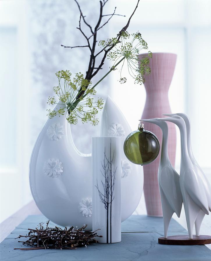 Crane Figurines In Front Of Branches And Various Vases Photograph by Matteo Manduzio
