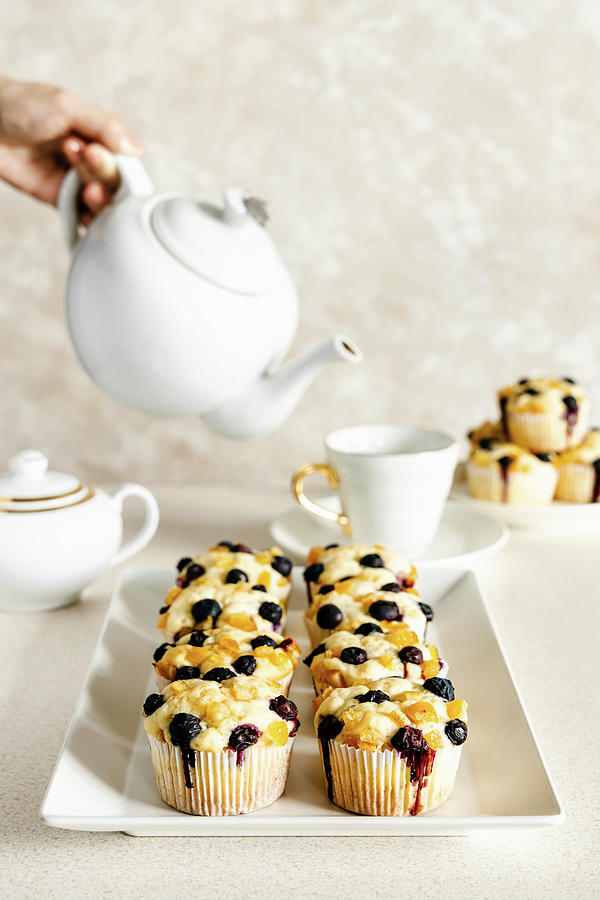Cream Cheese Muffins With Blueberry And Orange Candied Fruit Photograph by Alla Machutt