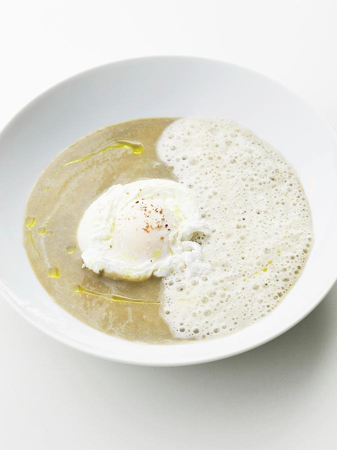 Cream Of Lentil Soup With A Poached Egg And Frothy Milk Photograph by Atelier Mai 98