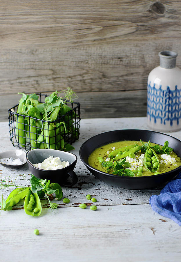 Cream Of Pea Soup With Mint And Feta Cheese Photograph by Ewgenija Schall
