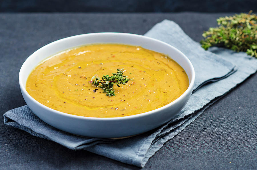 Cream Of Pumpkin Sauce With Thyme, Olive Oil And Coarsely Ground Pepper Photograph by Giulia Verdinelli Photography