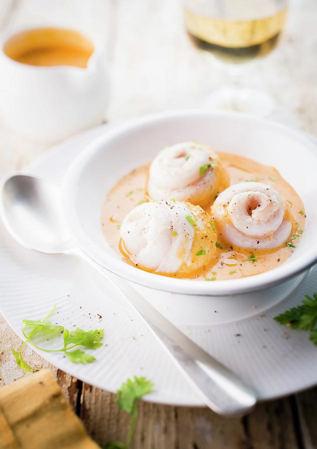 Cream Of Pumpkin Soup With Rolled Sole Fillets Photograph by Bonnier
