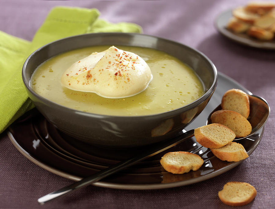 Cream Of Split Pea Soup With Spicy Hot Whipped Cream Photograph by Bertram