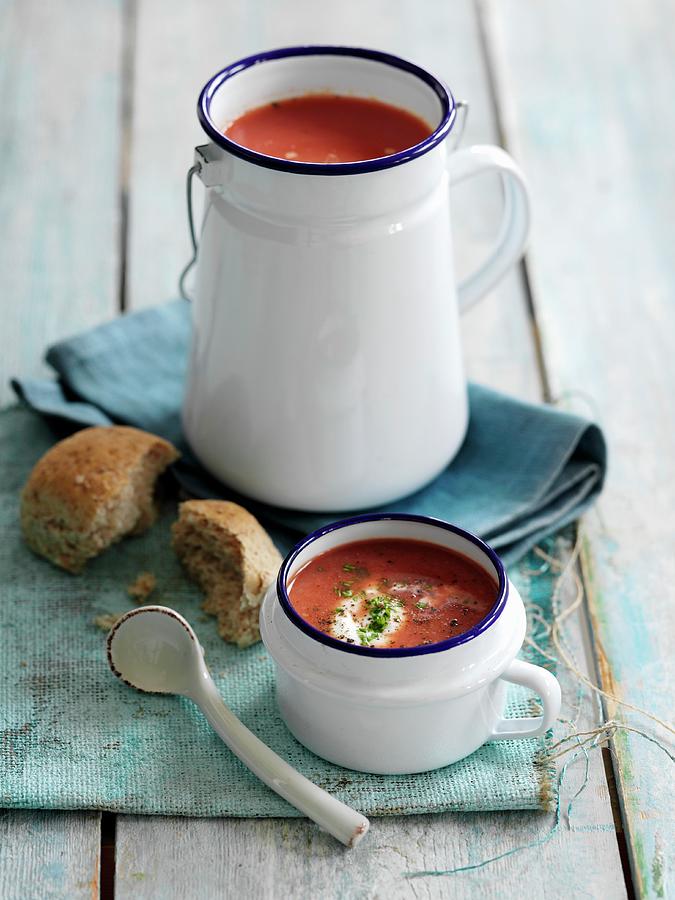Cream Of Vegetable Soup In An Enamel Jug And And An Enamel Mug Photograph by Gareth Morgans