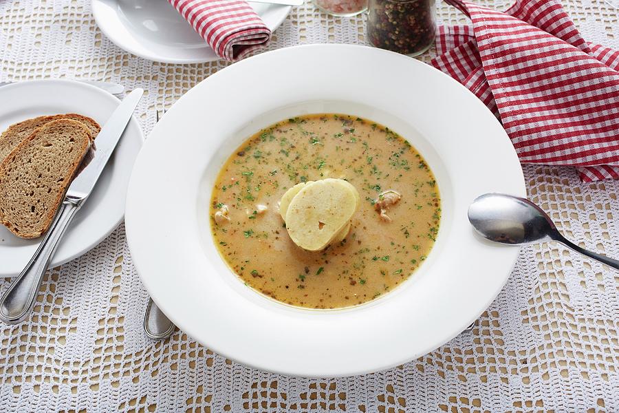 Cream Of Venison Soup With A Quark And Semolina Dumpling Photograph by Herbert Lehmann
