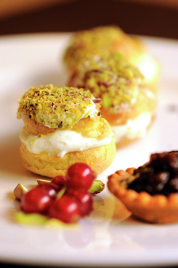 Cream Puffs With Gorgonzola Cream And Pistachios Photograph by Franco Pizzochero