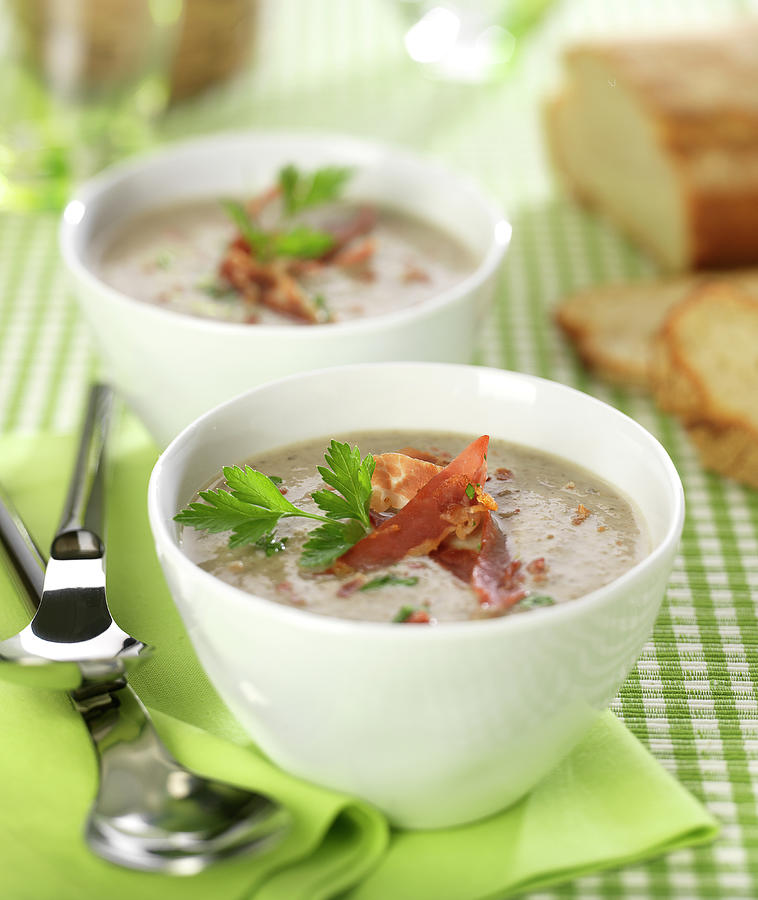 Creamed Mushroom Soup With Thin Strips Of Crispy Bacon Photograph by Bertram