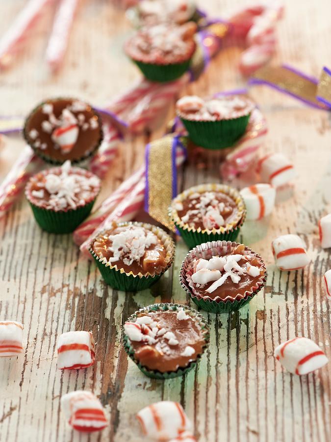 Creamy Caramel Confectionery With Chopped Mint Bonbon Photograph by Hannah Kompanik