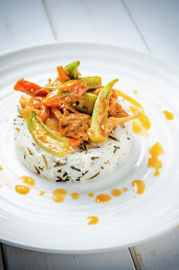 Creamy Chicken With Okra, Red, Yellow And Green Peppers In A Creamy Tomato Sauce On White And Brown Long Grain Rice Photograph by Giulia Verdinelli Photography