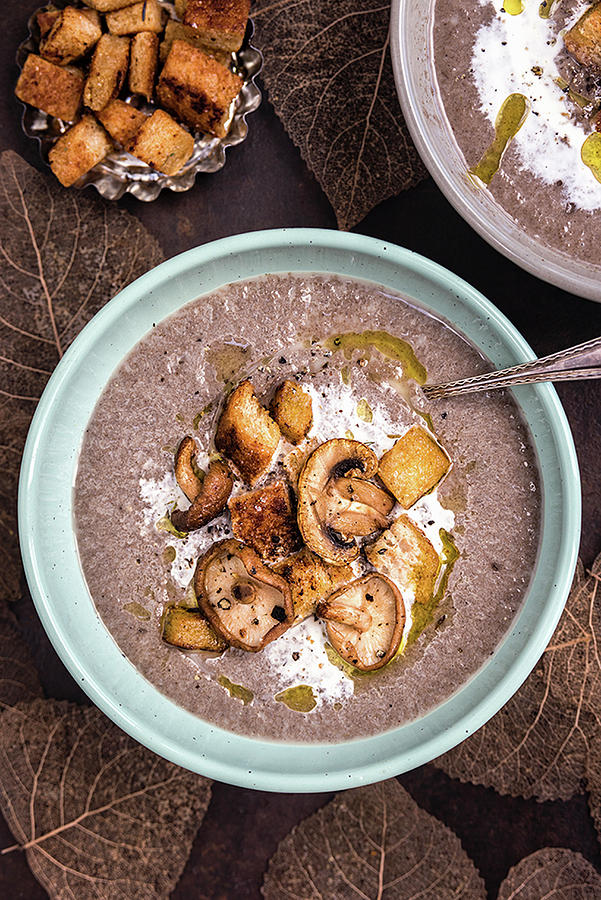 Creamy Mushroom Soup With Garlic Croutons Photograph by Lucy Parissi