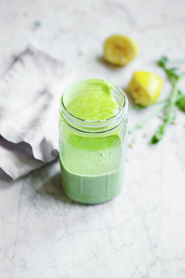 Creamy Pesto Dressing In A Glass Photograph by Rocio Stella Graves ...