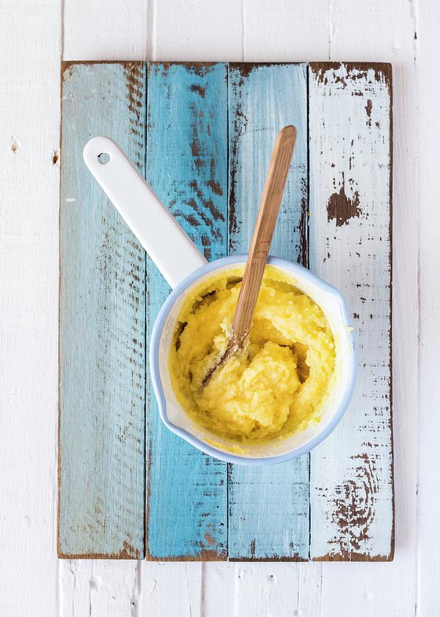 Creamy Polenta In A Saucepan Photograph by Hein Van Tonder