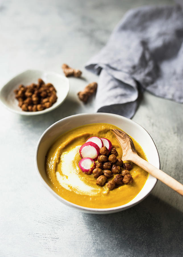 Creamy Yellow Beetroot Soup With Radishes And Chickpeas Photograph by Lisa Rees