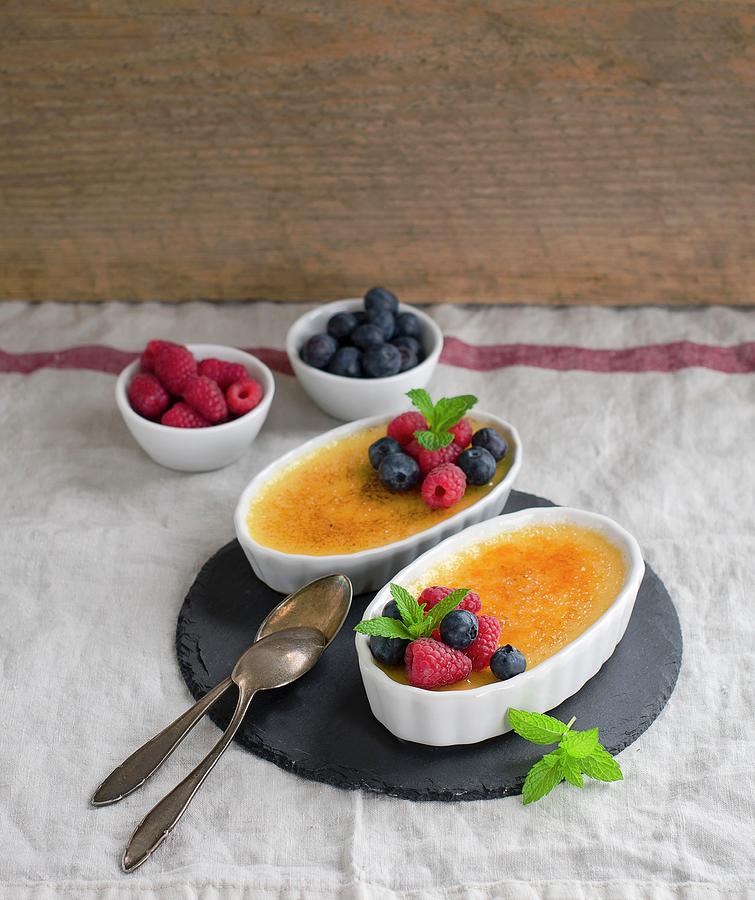 Creme Brulee With Raspberries And Blueberries Photograph by Ewgenija Schall