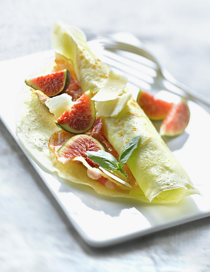 Cheese Photograph - Crepe Aux Figues, Parmesan Et Pancetta Rolled Pancake Filled With Figs,parmesan And Pancetta by Studio - Photocuisine