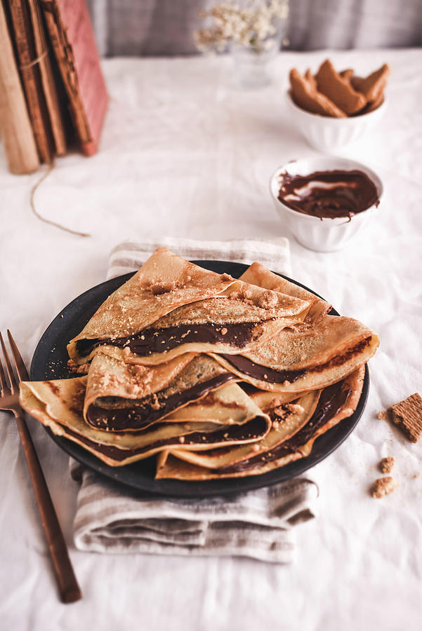 Crepes With Chocolate Cream And Nuts Photograph by Marianthi Konstantopoulou